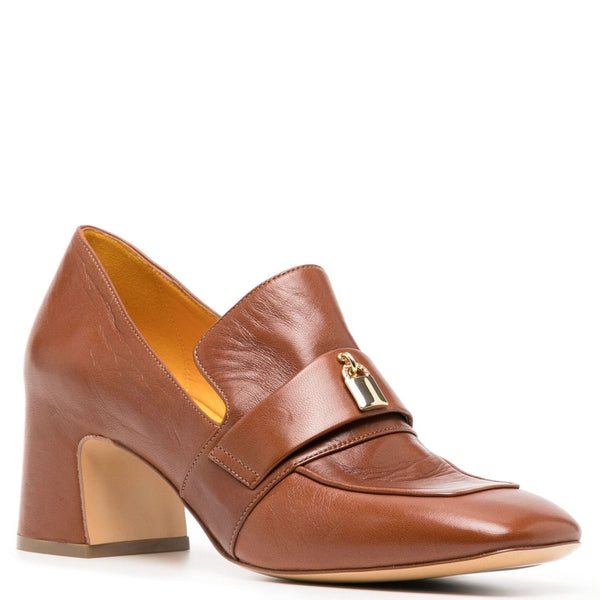 Tan leather loafer with pointed toe, block heel, and gold buckle strap detail