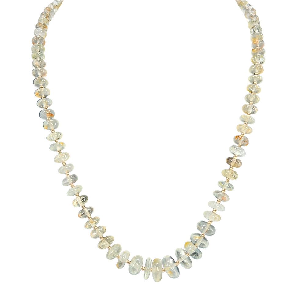 Opal-like beaded necklace with small round faceted stones in pale blue and cream