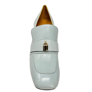 Seafoam leather loafer with gold lock hardware, seam detail, and slip-on top