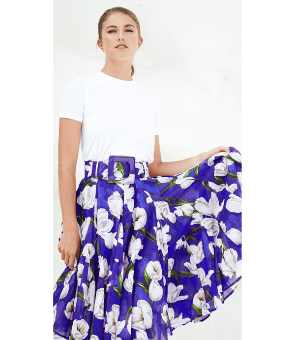 Cobalt blue floral midi skirt with white tulips and green stems, pleated, elastic waist