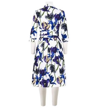 Back view: white tulip-print long dress with belted waist and button collar