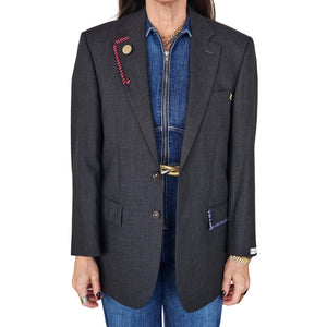 Charcoal blazer with notch lapels, button front, and colored trim pockets