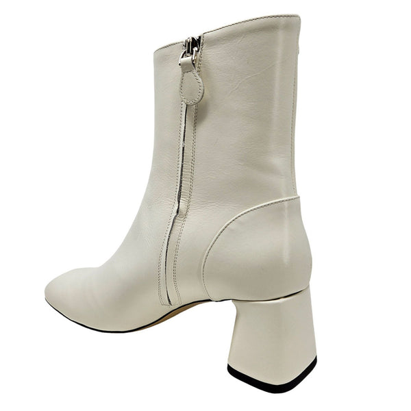 Off-white ankle boot with side zipper, rounded toe, chunky block heel