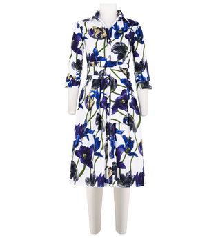 White long-sleeve dress with blue and purple floral print, collared button front, waist tie