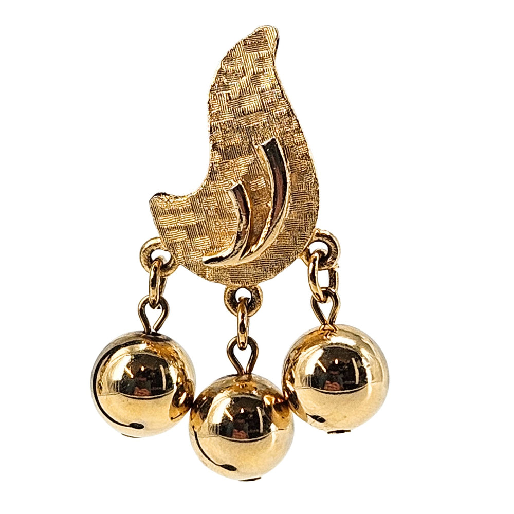 Pair of gold clip-on earrings with textured arcs and three dangling ball charms