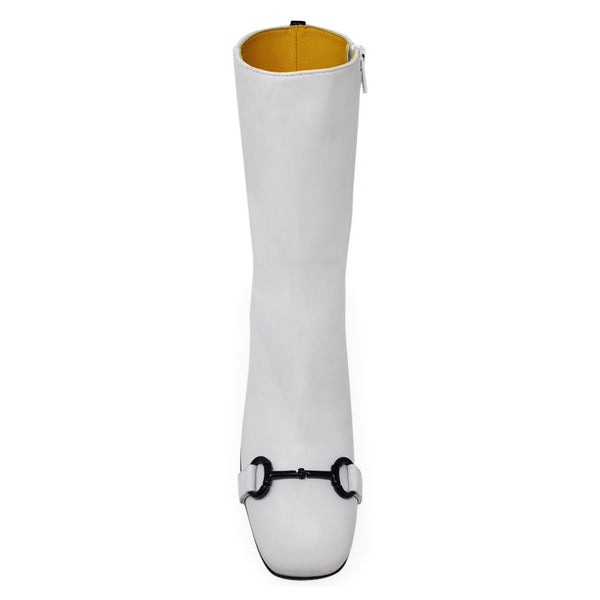 White leather mid-calf boot with open top and tan interior lining
