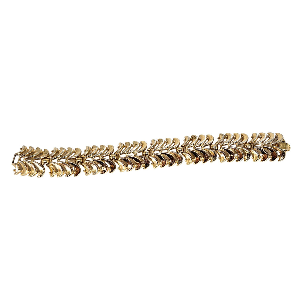 Gold-tone wave cuff bracelet, curved with scalloped chain link pattern