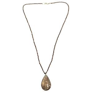 Copper-tone chain necklace with teardrop rutilated quartz pendant
