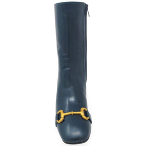 Teal leather mid-calf boot with gold buckle accent at front and block heel