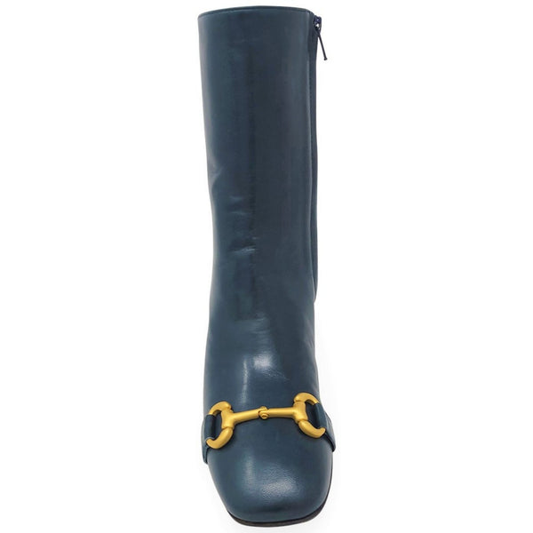 Teal leather mid-calf boot with gold buckle accent at front and block heel