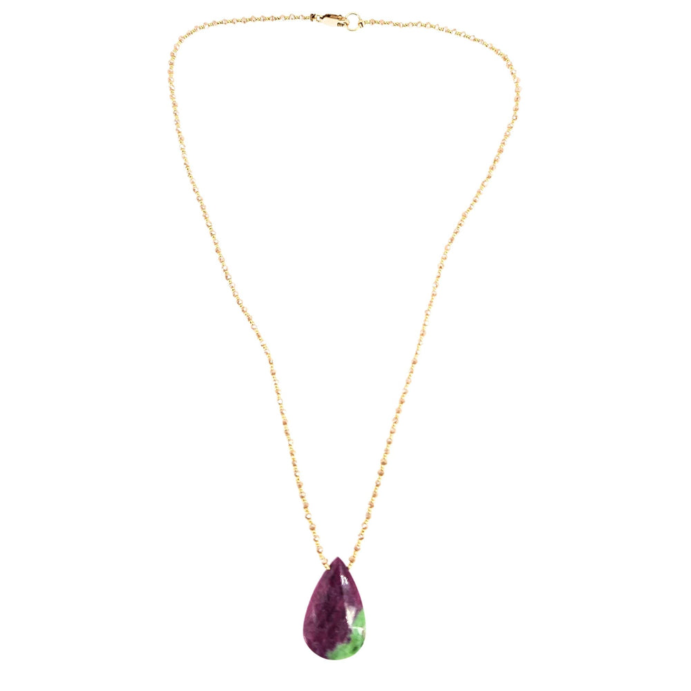 Gold-tone chain necklace with large ruby-red and green teardrop gemstone pendant