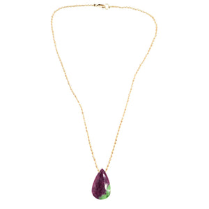 Gold-tone chain necklace with ruby-red and green teardrop gemstone pendant