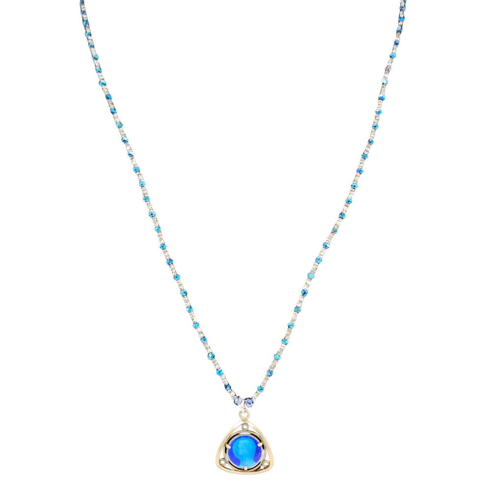 Blue beaded necklace with blue heart pendant and small clear accents