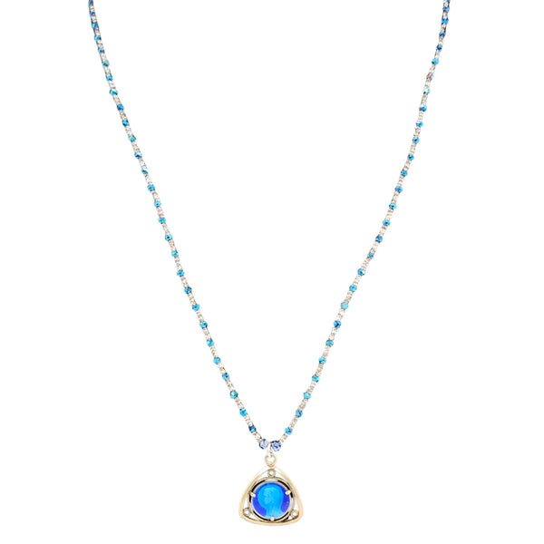 Blue beaded necklace with blue heart pendant and small clear accents