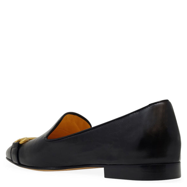 Black leather loafer with square toe, gold buckle hardware, and stacked low heel