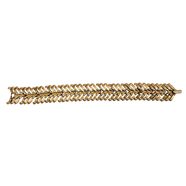 Goldtone vintage link bracelet, flat view of interlocking chain links with ridged texture