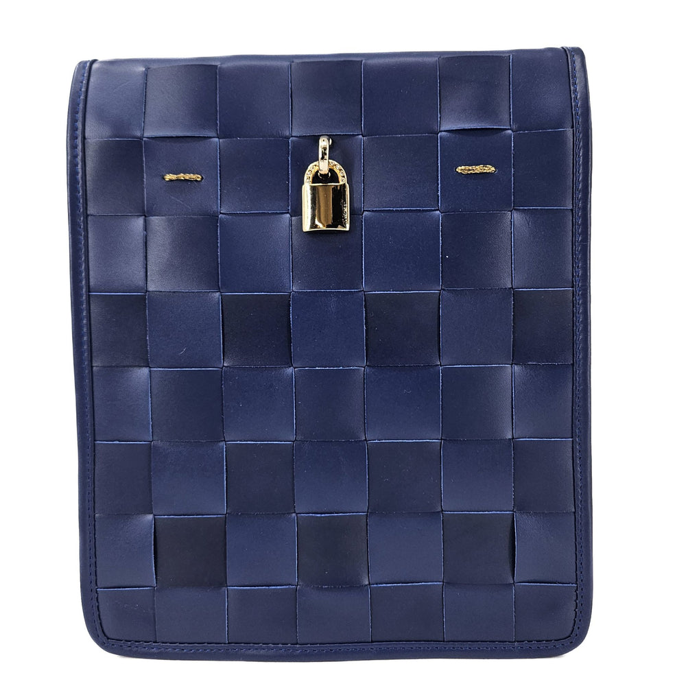 Navy woven leather crossbody bag with gold lock and detachable strap