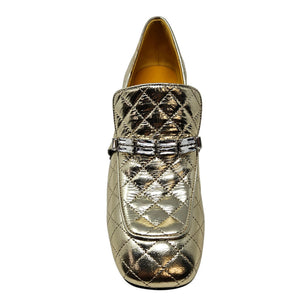 Gold quilted leather loafer with metallic finish and adjustable buckle strap, almond toe