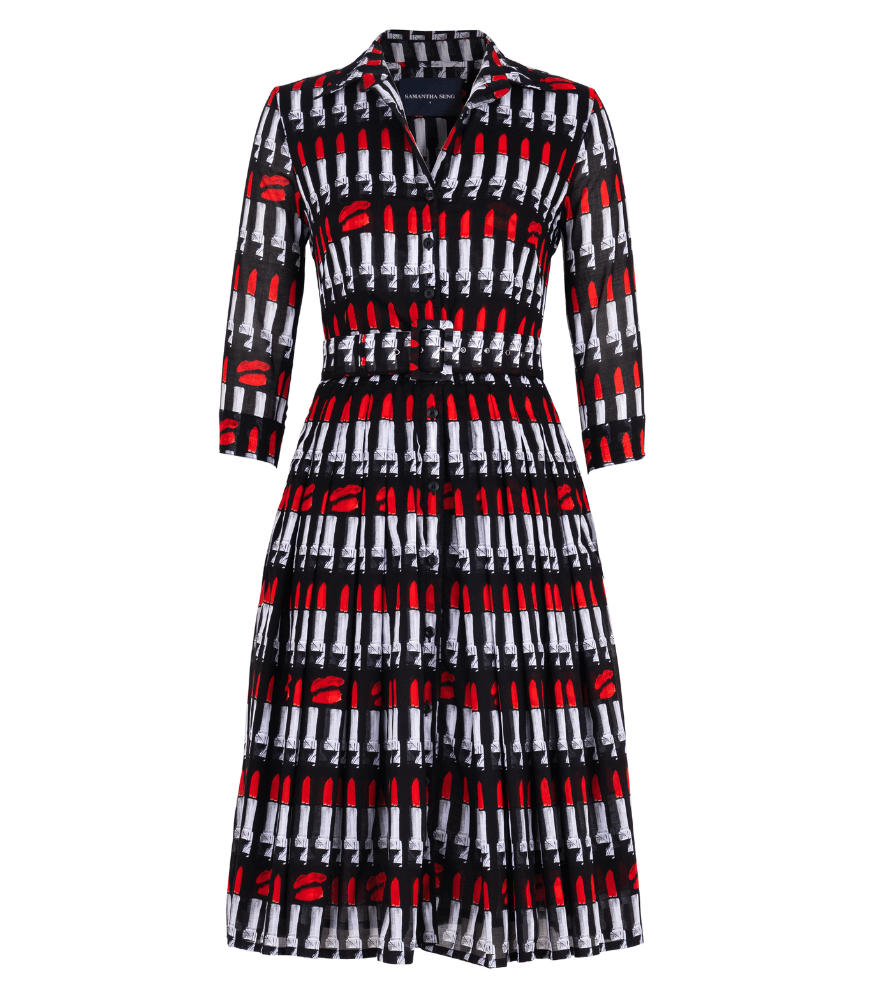 Long-sleeve dress with black base and red-and-white lipstick pattern, buttoned front