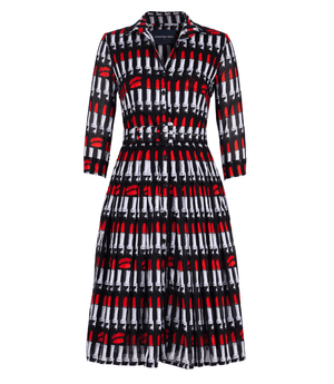 Long-sleeve dress with black base and red-and-white lipstick pattern, buttoned front