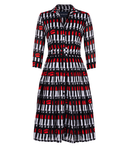 Long-sleeve dress with black base and red-and-white lipstick pattern, buttoned front