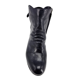 Navy leather ankle boot with pull tab at topline, rounded toe