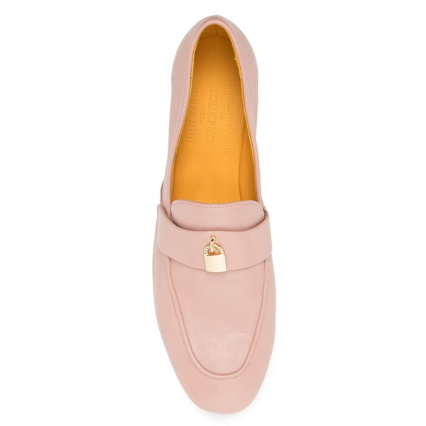 Light pink leather loafer with gold-tone lock strap and visible cushioned lining