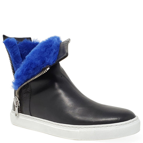 Black leather ankle boot with side zipper and bright blue shearling trim at the opening