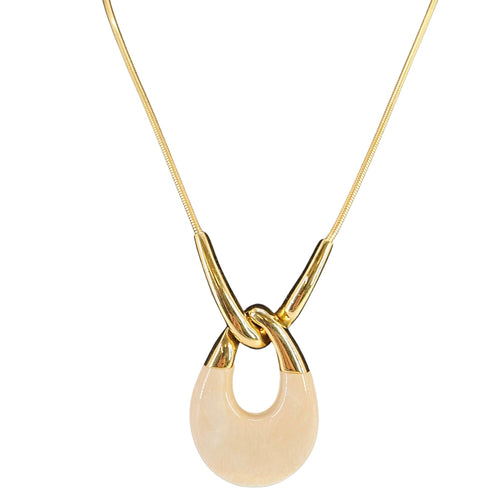 Gold-tone chain necklace with oval ivory lucite pendant and linked ring detail