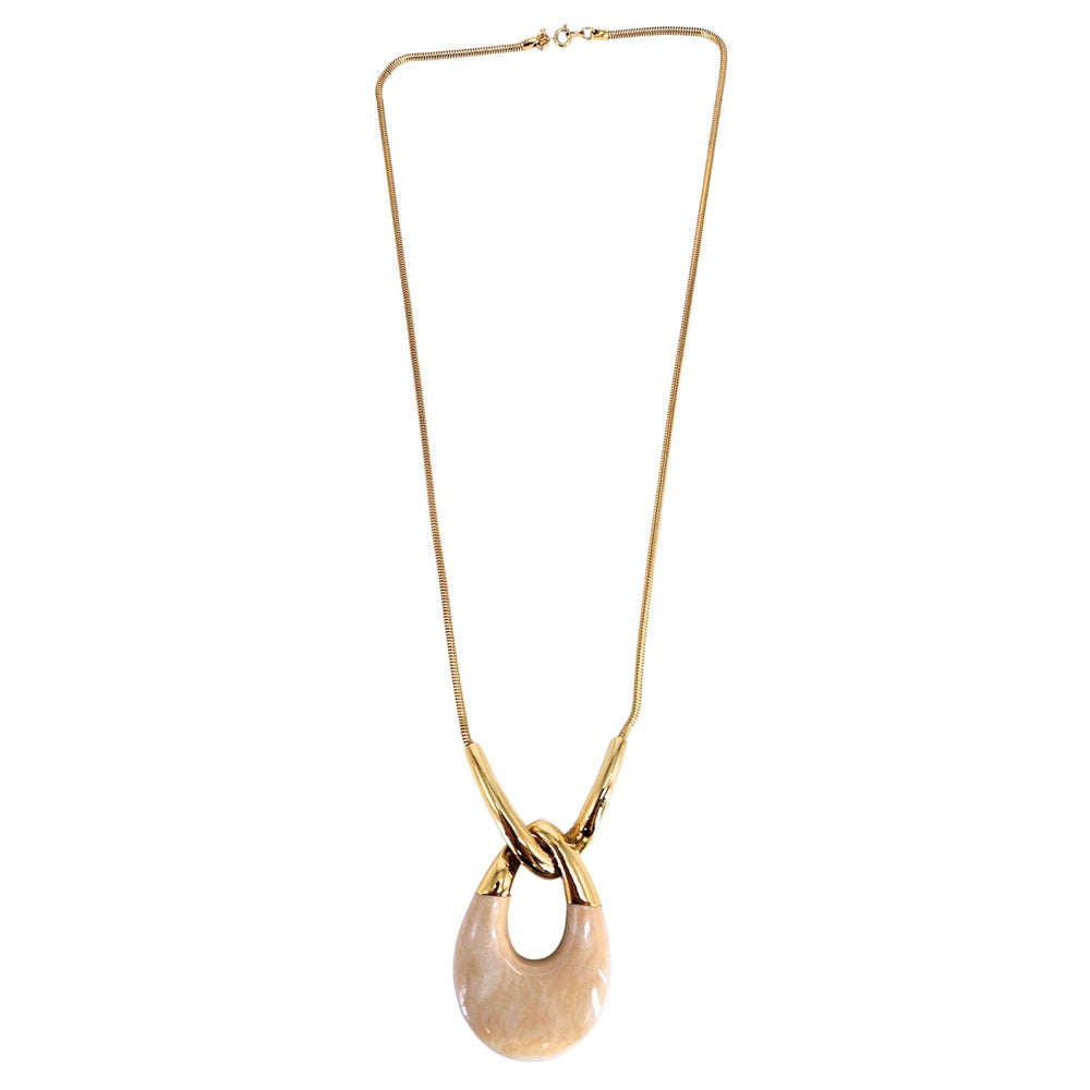 Gold-tone chain necklace with oval ivory lucite pendant and linked ring detail