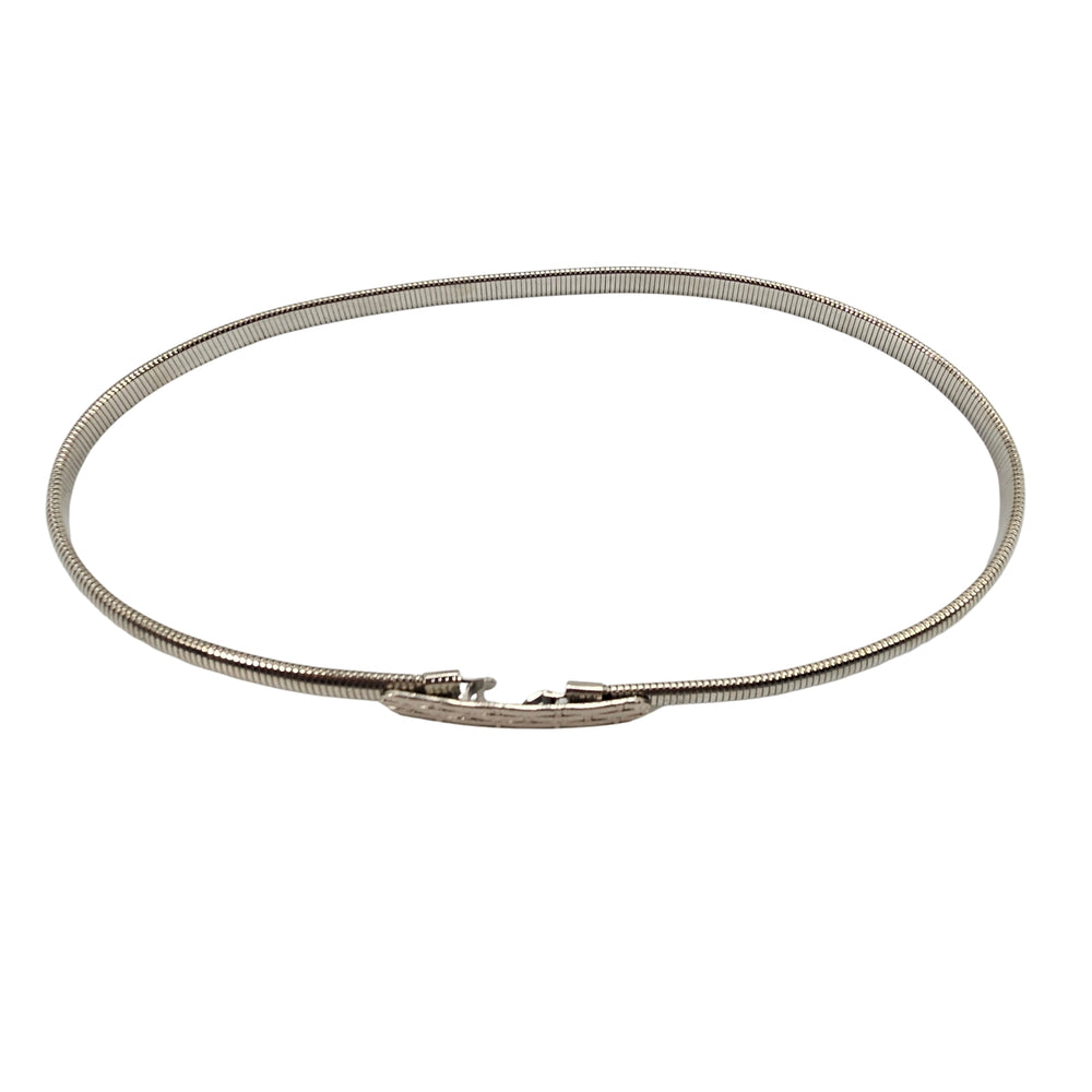 Silver coiled stretch belt with small rectangular buckle at center