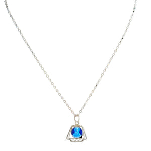 Silvertone pendant necklace with blue Virgin Mary cameo in triangular frame