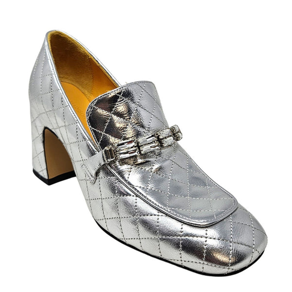 Silver quilted leather loafer, side view, with metal buckled strap