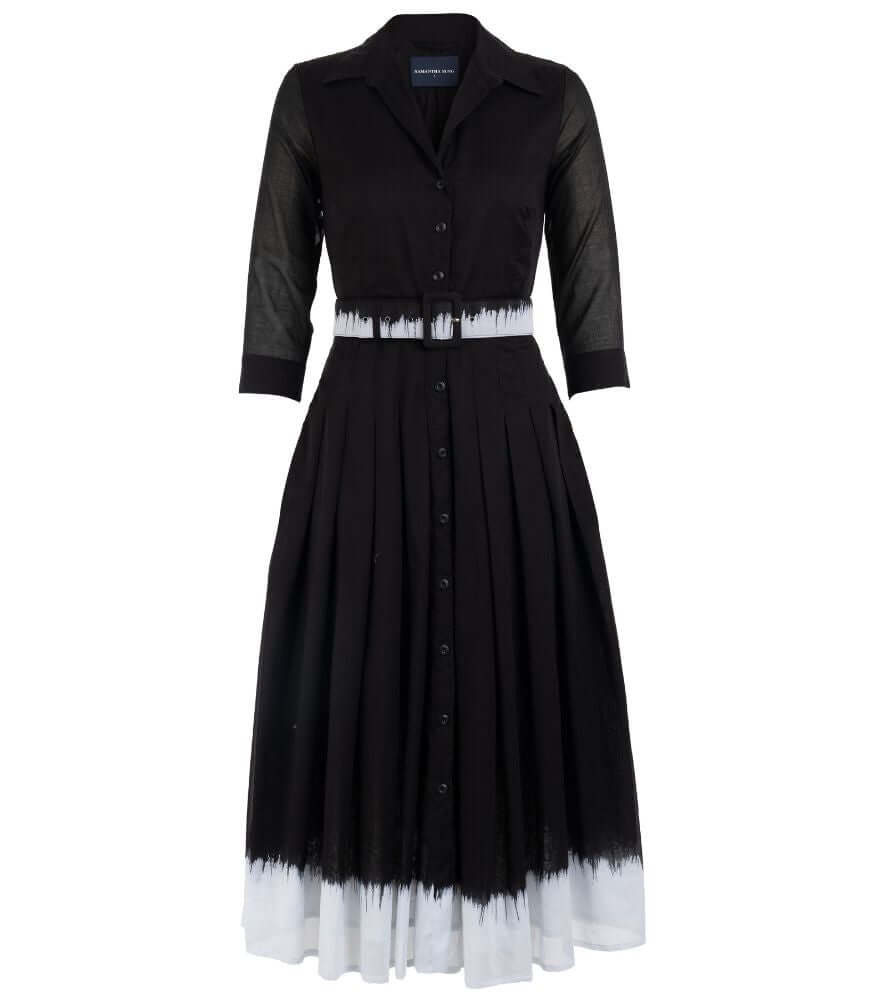 Black long button-front dress with collar, gathered skirt, and white hem border