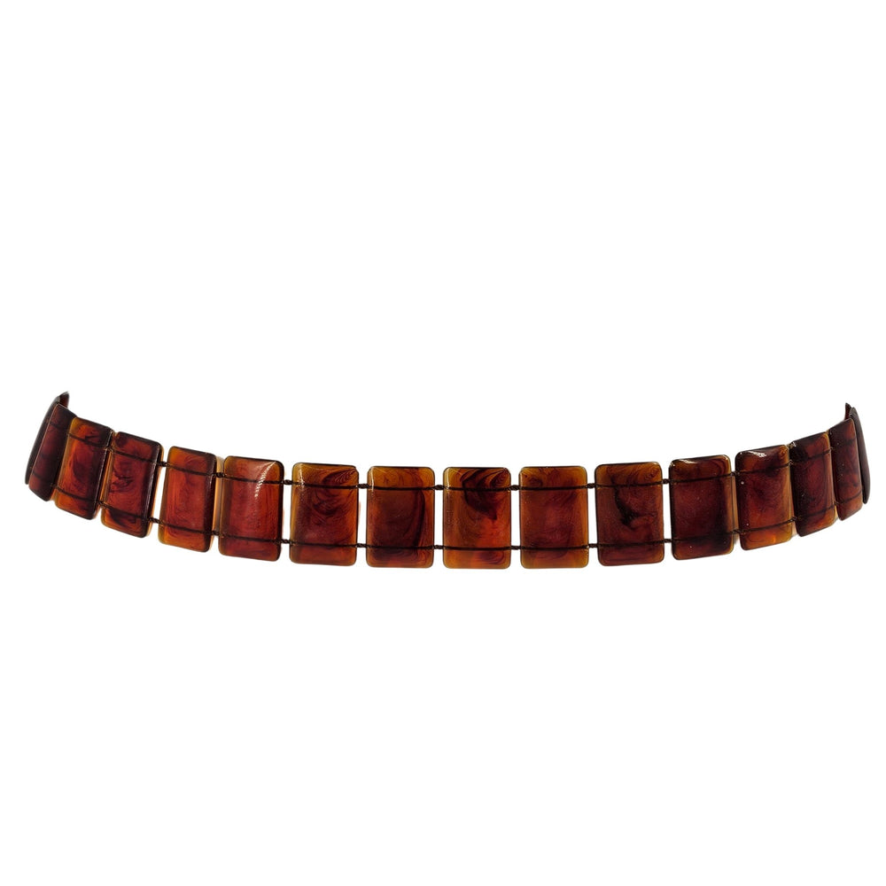 Tortoise-brown vintage link belt with rectangular celluloid-style panels and chain ties