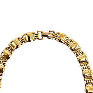 Gold-tone chain collar necklace detail of repeating rectangular link pattern