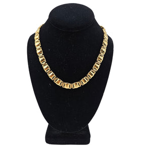 Gold-tone link collar necklace with repeating rectangular chain links, choker length