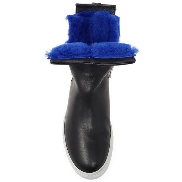 Black leather ankle boot back view with blue shearling cuff and white rubber sole