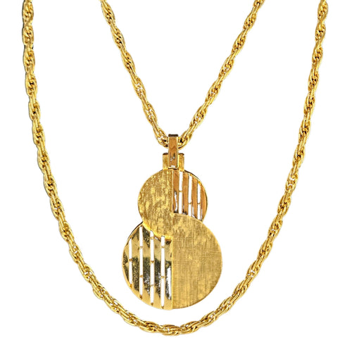 Gold-tone pendant necklace with stacked round cutout discs and linked chain