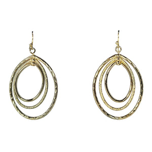 Gold-tone etched oval dangle earrings with layered multi-oval rings