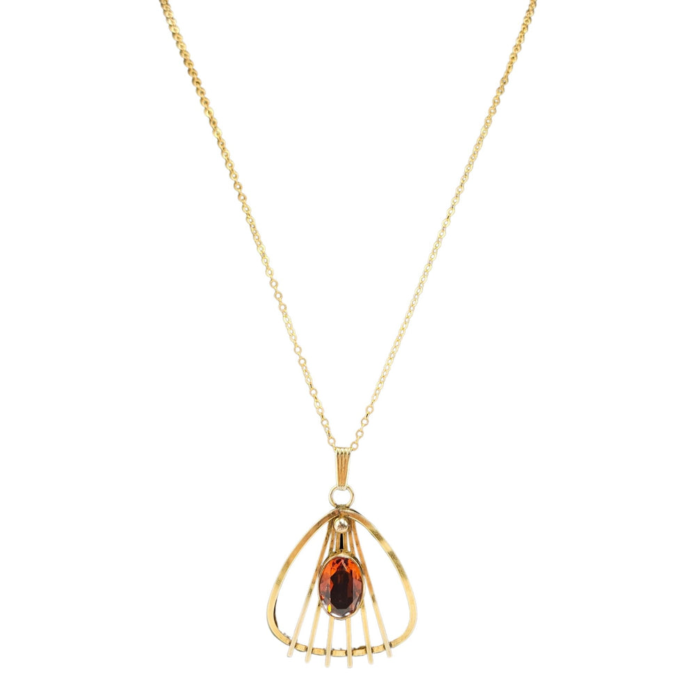 Antique goldtone art deco pendant necklace with teardrop gemstone and loop bail