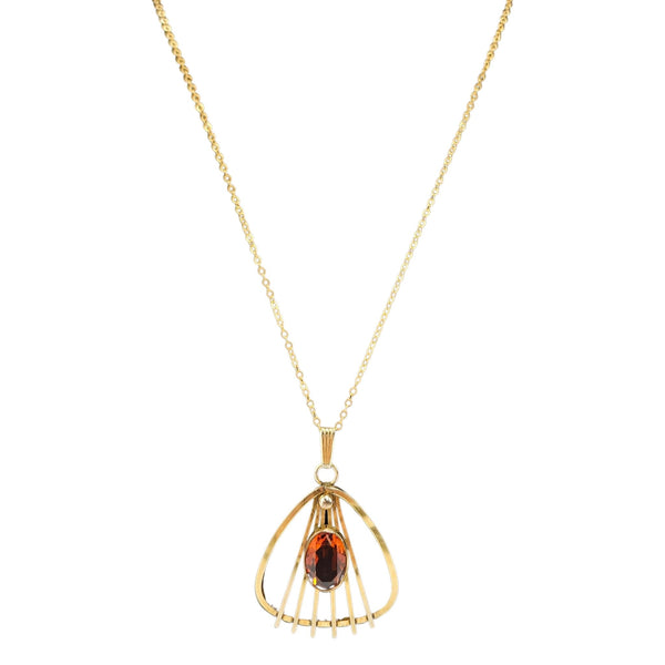 Antique goldtone art deco pendant necklace with teardrop gemstone and loop bail