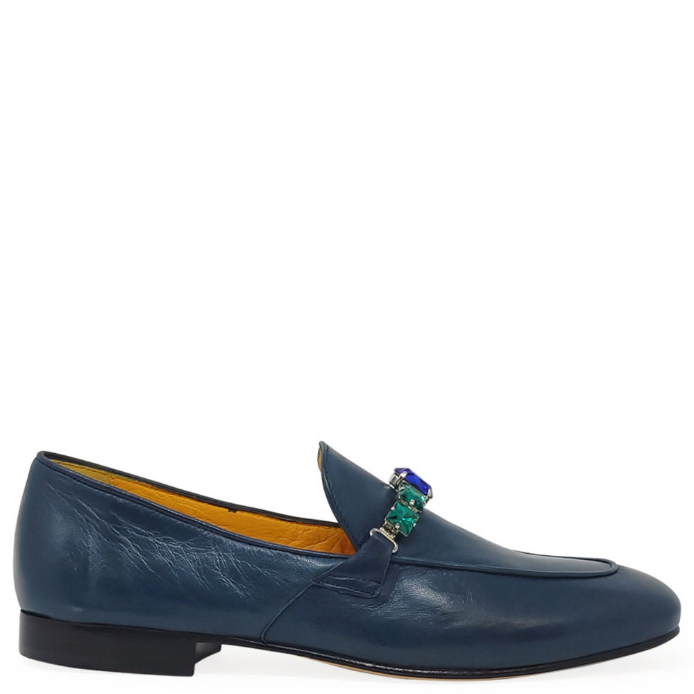 Blue leather flat loafer with colorful jeweled ornament at the top