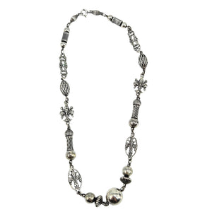 Sterling silver station necklace with fleur-de-lis charms and alternating textured bead links