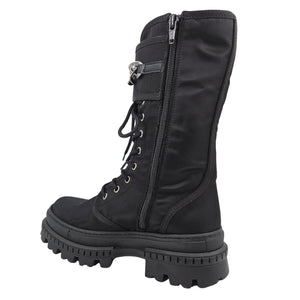 Black combat boot with side zipper, lace-up front, and chunky tread sole