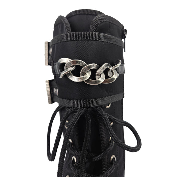 Black combat boot cuff with large silver chain links and lace-up front