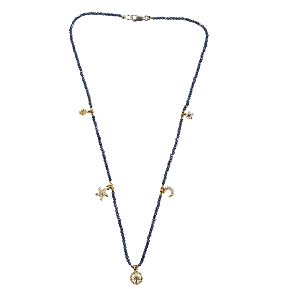 Blue faceted bead charm necklace with gold-tone star, crescent, and round pendant