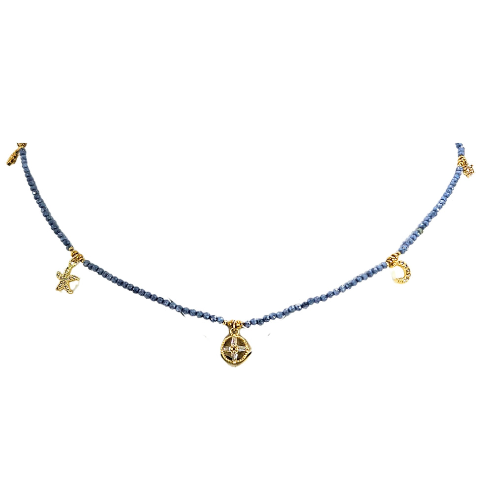 Blue faceted bead charm necklace with gold-tone star, crescent, and round pendant