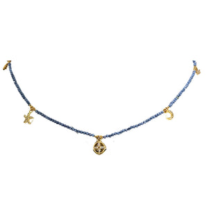Blue faceted bead choker necklace with gold-tone star, moon, and center round charm