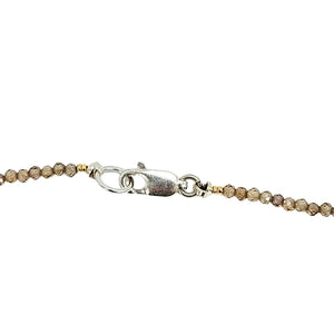 Brown faceted bead necklace with silver clasp and link detail